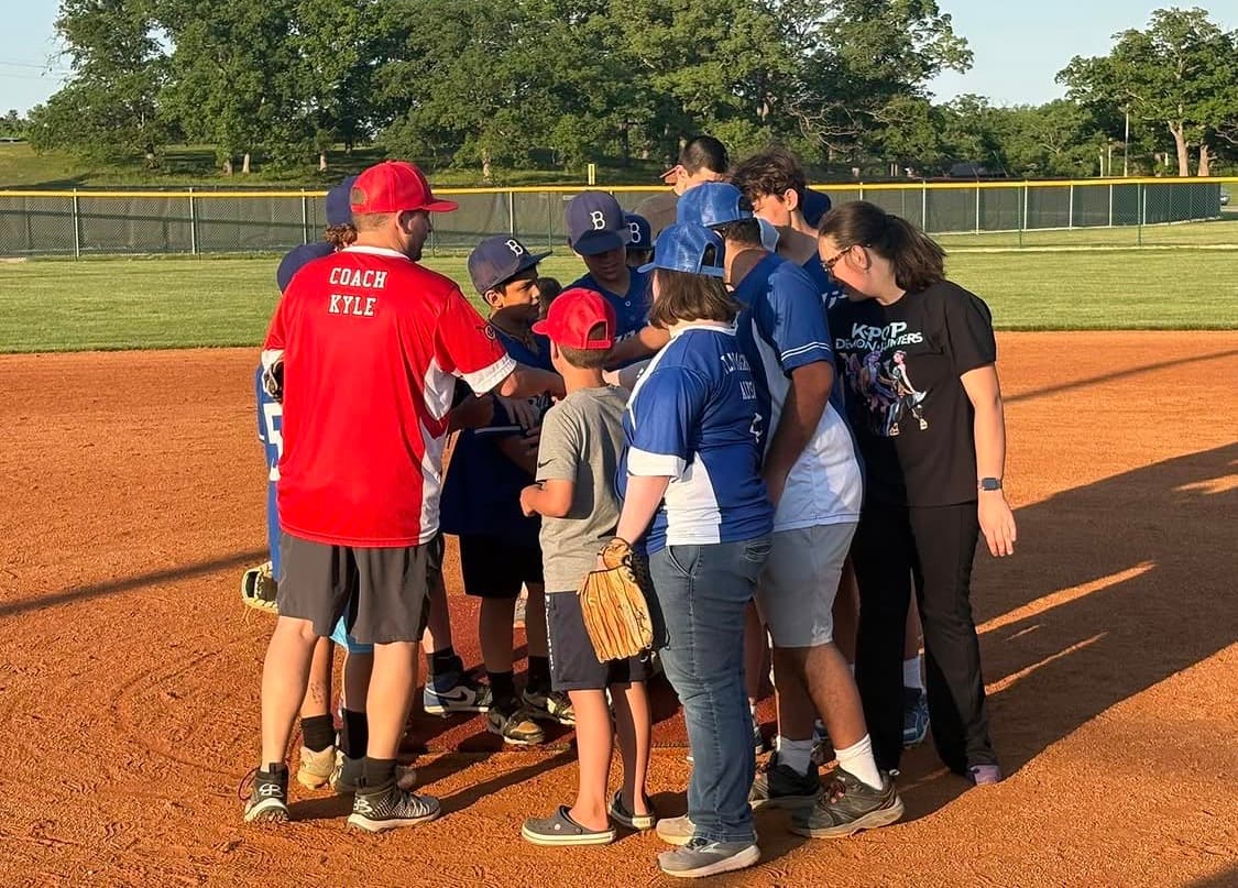 McHenry County Bandits team huddle with Coach Kyle before a game